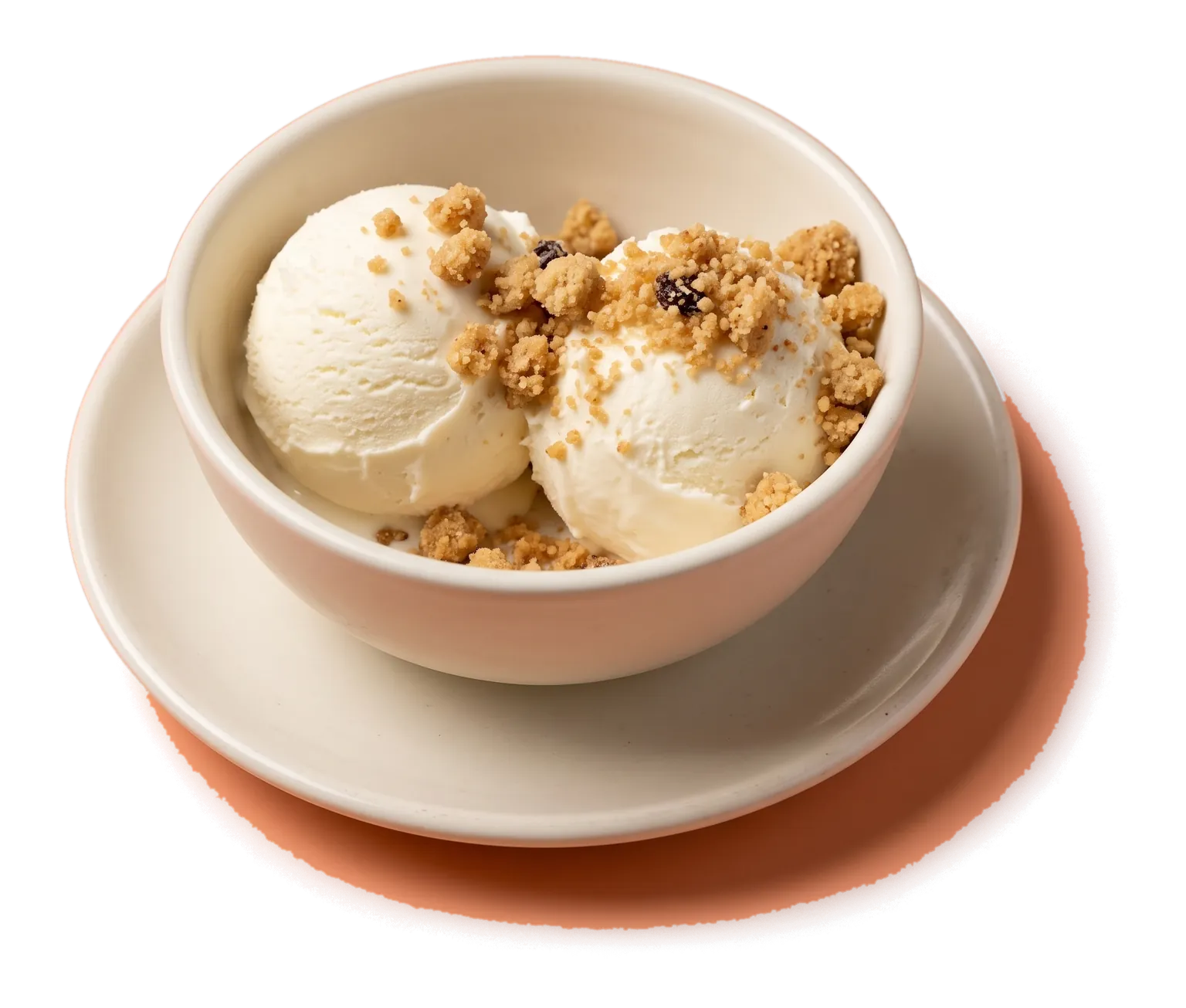 Scoops of plombir in a small ceramic bowl, scattered with zhent crumbs